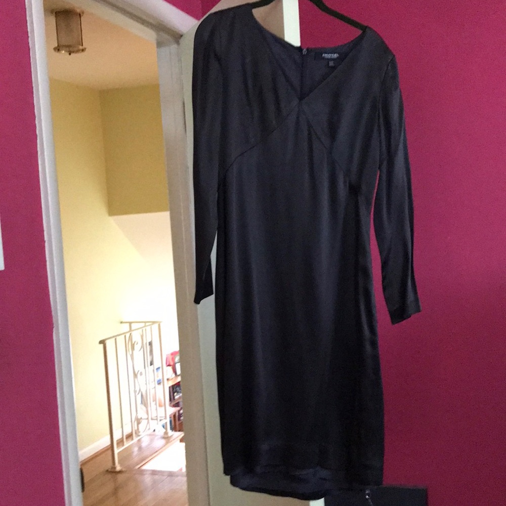 Beautiful classic LBD.  Fully lined slight high low hemline.